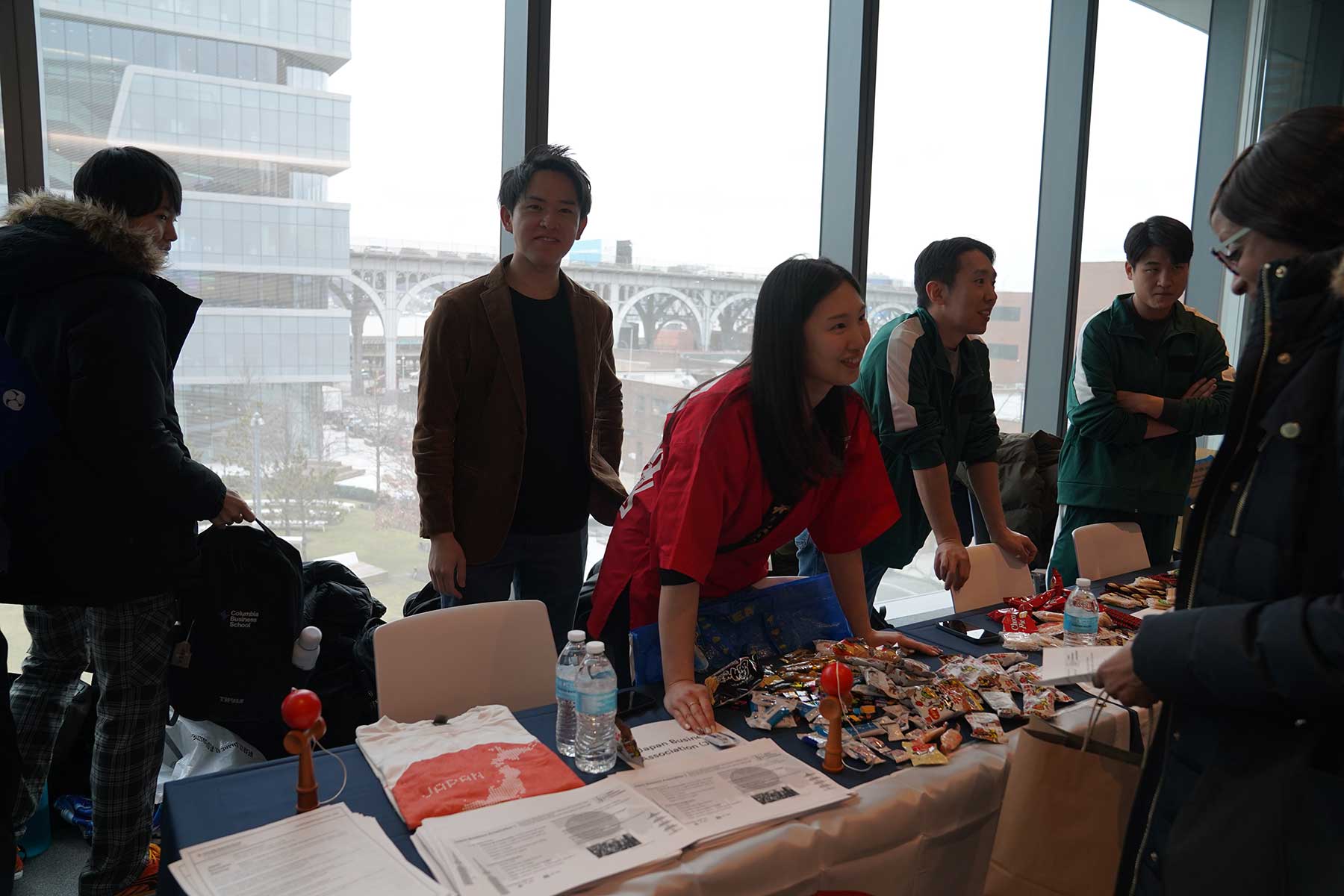 a student club representative speaking with a student about joining their club